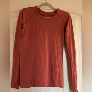 Light brown Lululemon swiftly tech, size 6.